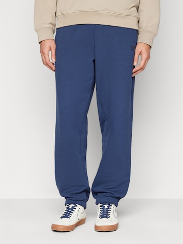 ALPHA INDUSTRIES Tapered Trousers 'Essentials' in Blue: front