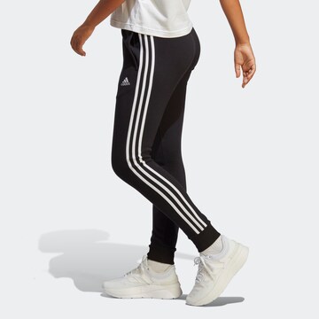 ADIDAS SPORTSWEAR Tapered Sportbyxa 'Essentials' i svart