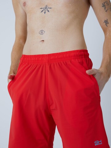 Regular Pantalon de sport 'Shorts regular' SPORTKIND en rouge