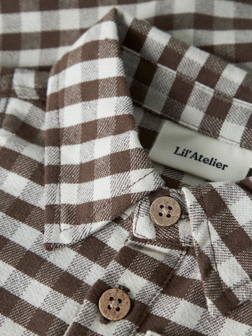 Tutina / body per bambino di Lil'Atelier in marrone