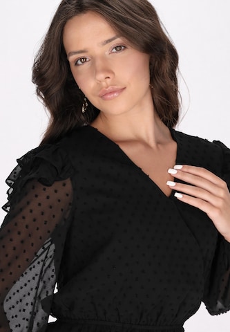 Camicia da donna di faina in nero