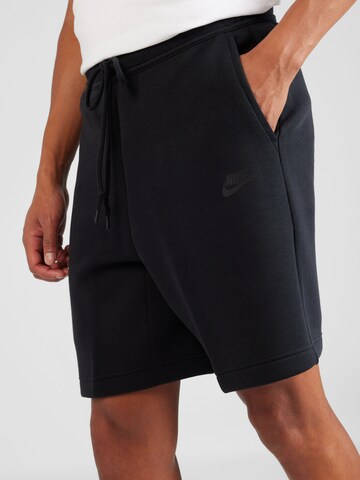 Nike SportswearLoosefit Hlače - crna boja