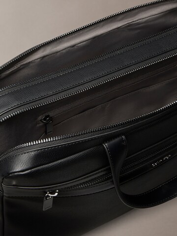 Sac d’ordinateur portable Calvin Klein en noir