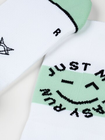 INCYLENCE Athletic Socks 'MOTTO RUNNING' in Green