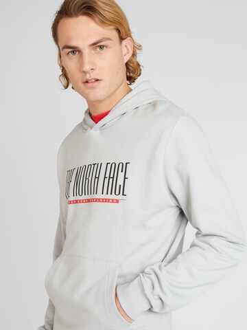 THE NORTH FACE - Sweatshirt 'EST 1966' em cinzento