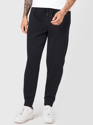 Tapered Pantaloni sport de la OAKLEY pe negru: față