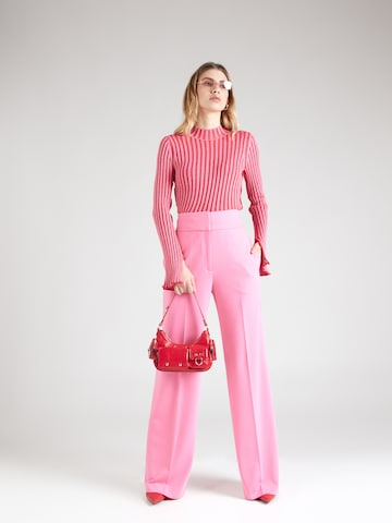 Loosefit Pantaloni cu dungă 'Himia' de la HUGO Red pe roz