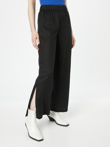 DEDICATED. Regular Pants 'Koster' in Black: front