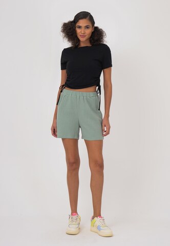 FRESHLIONS Regular Trousers in Green