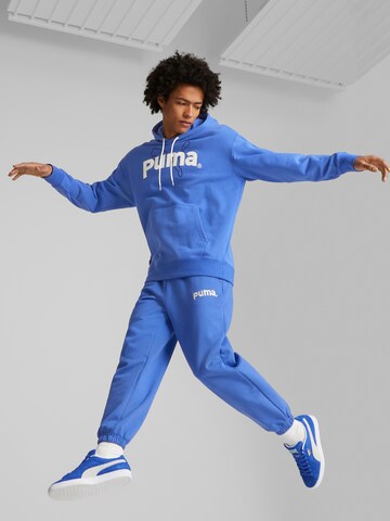 PUMA - Tapered Calças em azul