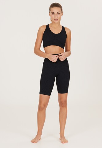 Athlecia - Skinny Pantalón deportivo 'Empower' en negro