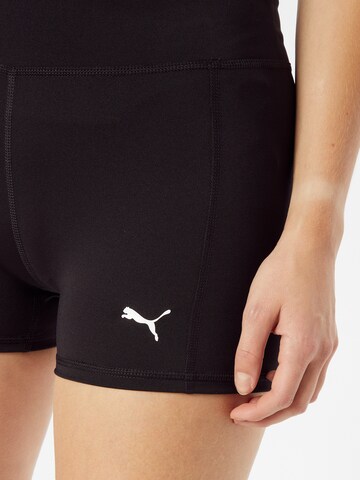 regular Pantaloni sportivi 'Train Favorite' di PUMA in nero