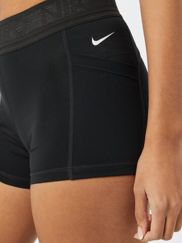 NIKE Skinny Spodnie sportowe w kolorze czarny