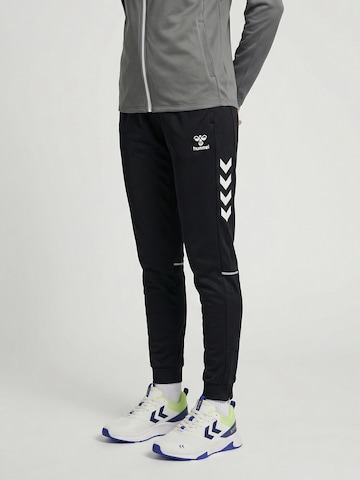 Hummel Slim fit Sports trousers 'Core 2.0' in Black: front