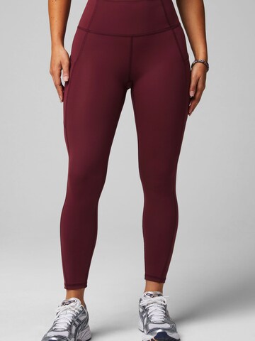 Fabletics Skinny Workout Pants 'Oasis' in Red: front