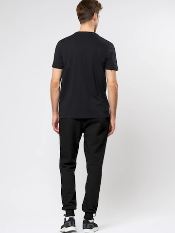 KAPPA - Regular Calças 'KMLogo Caseri' em preto