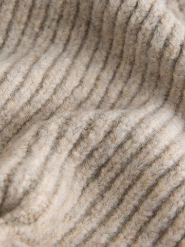 Bonnet Next en beige