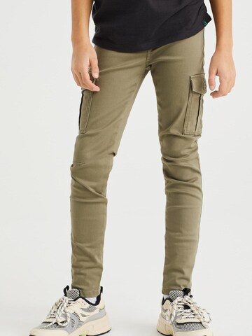 Skinny Jeans di WE Fashion in verde