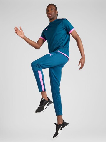PUMA Slimfit Športne hlače 'TeamLIGA' | modra barva
