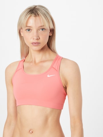 NIKE Regular Sports Bra in Pink: front