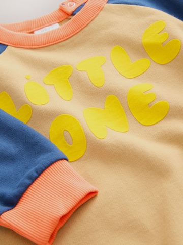 Tutina / body per bambino di Next in beige