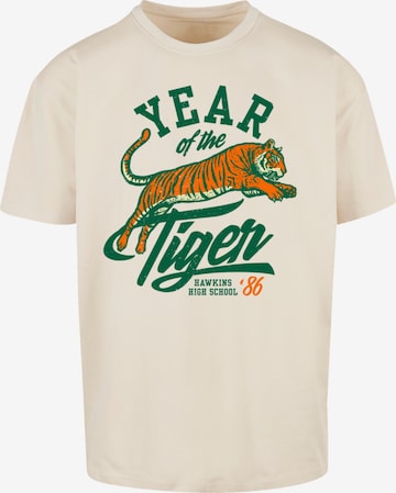 F4NT4STIC T-Shirt 'Stranger Things Hawkins Year of The Tiger 86 Netflix TV Series' in Beige: predná strana