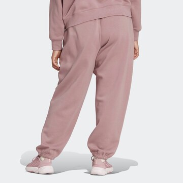 ADIDAS ORIGINALS Zwężany krój Spodnie 'Essentials' w kolorze różowy