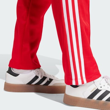 ADIDAS ORIGINALS Regular Trousers 'Montreal' in Red