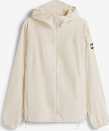 Tommy Jeans Преходно яке в бежово: отпред