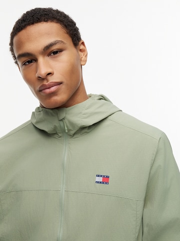 Tommy Jeans Tussenjas 'CHICAGO' in Groen