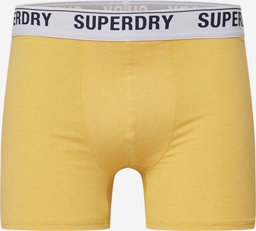 Superdry Boxerky – žlutá: přední strana