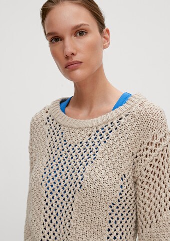 Pullover di comma casual identity in beige