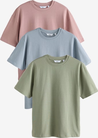 Next T-shirt i blå: framsida