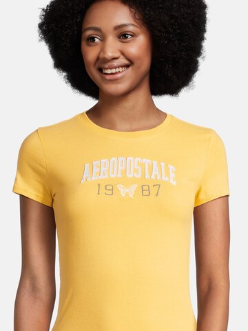 AÉROPOSTALE Shirt 'JKI ARCH 1987 BTTRFLY' in Yellow