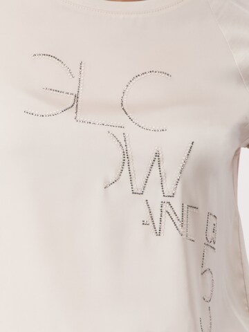 Camicia da donna di monari in beige
