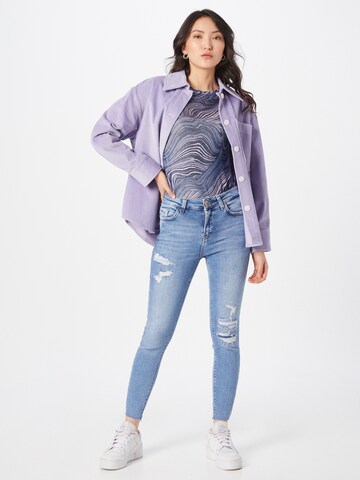 River Island - Skinny Calças de ganga em azul