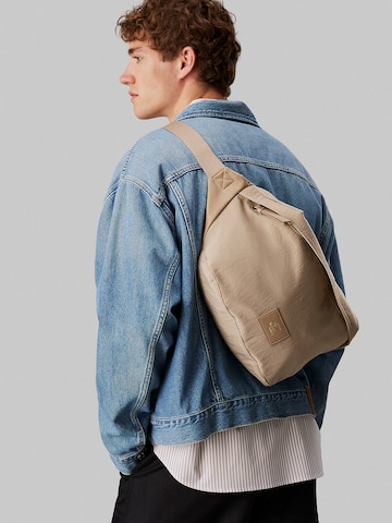 Calvin Klein Jeans Belt bag in Beige: front