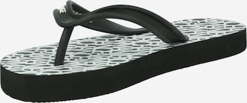 ARMANI EXCHANGE T-Bar Sandals in Black: front
