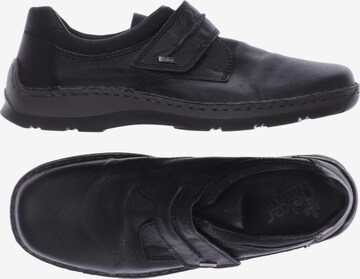Rieker Flats & Loafers in 44 in Black: front
