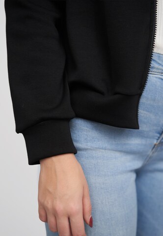 Cloud5ive Tussenjas in Zwart