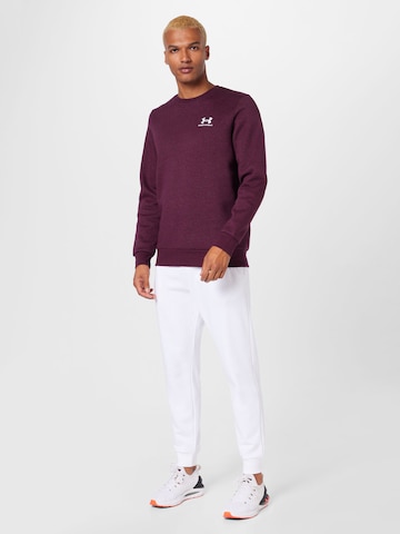 UNDER ARMOUR Tapered Sporthose in Weiß