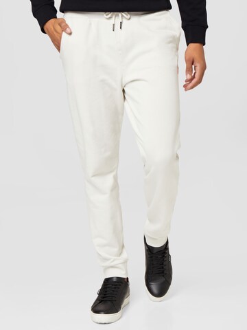 GUESS Tapered Pants 'ADAM' in White: front