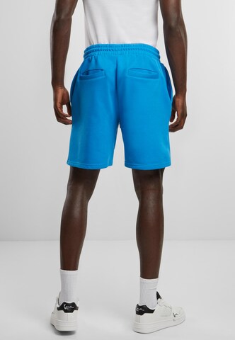 Karl Kani Loosefit Shorts in Blau