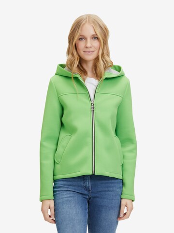 Amber & June Between-Season Jacket in Green: front