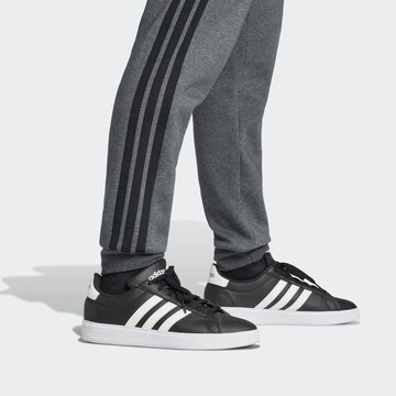 ADIDAS SPORTSWEAR Tapered Sports trousers 'Essentials' in Grey