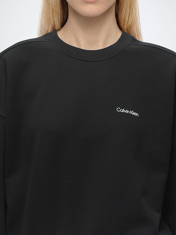 Calvin KleinSweater majica - crna boja