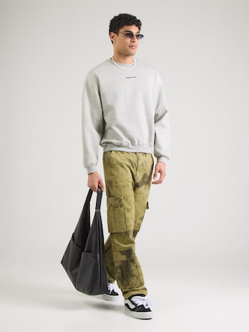 Kaotiko Bluzka sportowa 'ANOTHER ONE' w kolorze szary