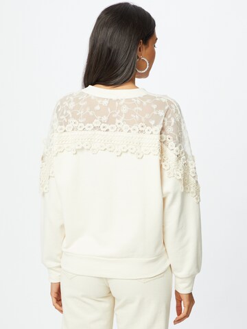 Cream Sweatshirt 'Kalanie' in Beige