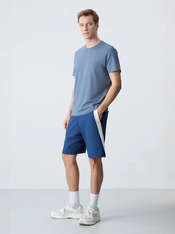 Regular Pantalon Tommy Life en bleu