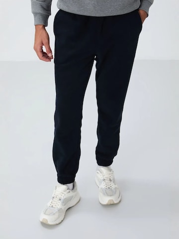 Pantaloni di Tommy Life in nero: frontale